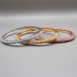 Lot of 3 Nolan Miller Swarovski Crystal Hinged Bangles Silver, Gold, Rose Gold